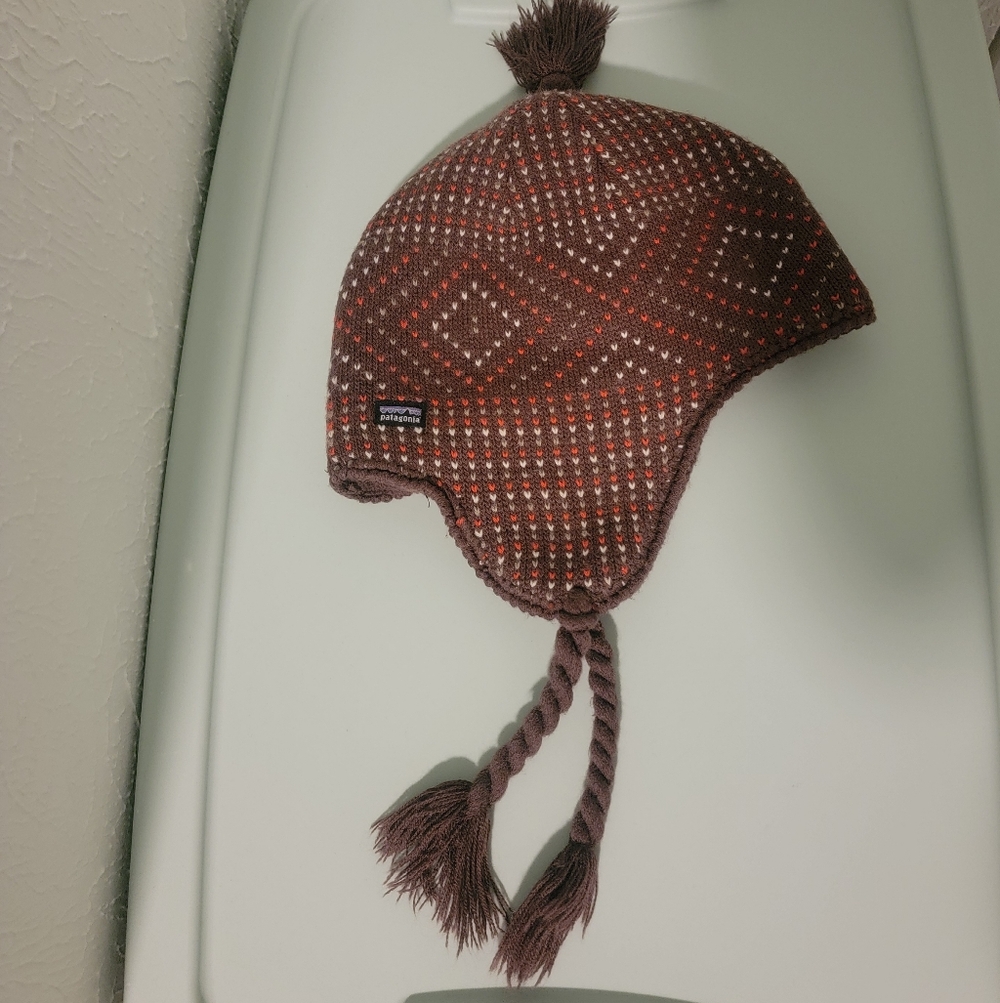 Patagonia fleece lined beanie with ear flaps, Brown with Heart Pattern.